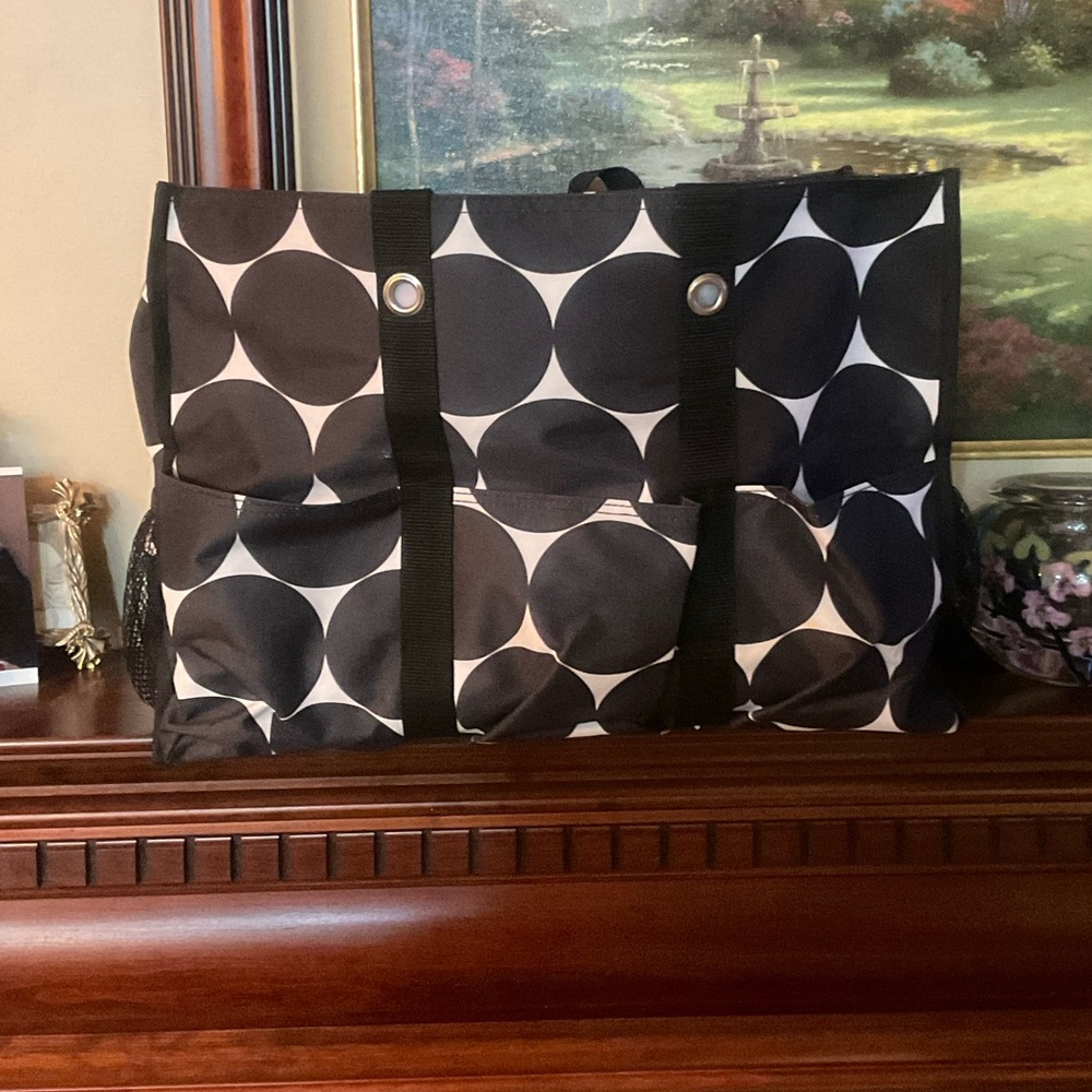 Beautiful Black and white tote bag with 7 outside pockets